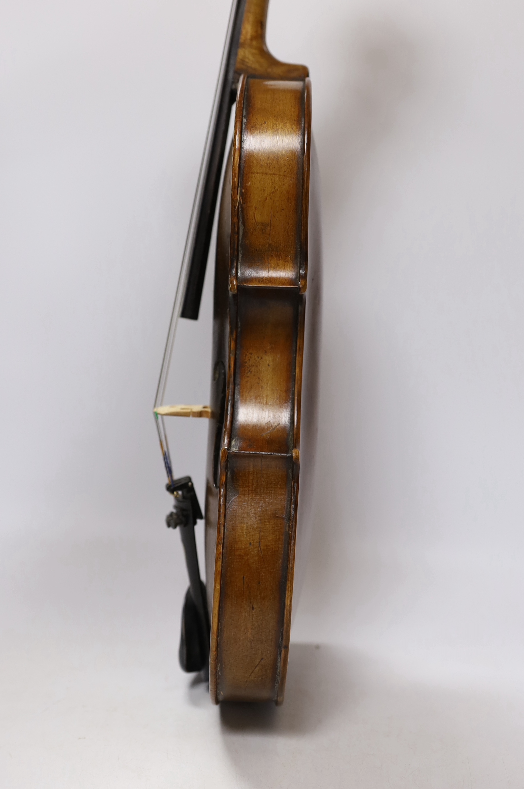 An early 20th century English violin stamped Norman Duke, London, one piece back with wax seal, cased, violin 60cm long